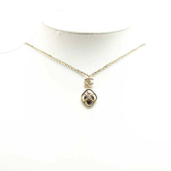 CHANEL Gold Diamond Logo Necklace